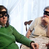 Two women at a dining room table